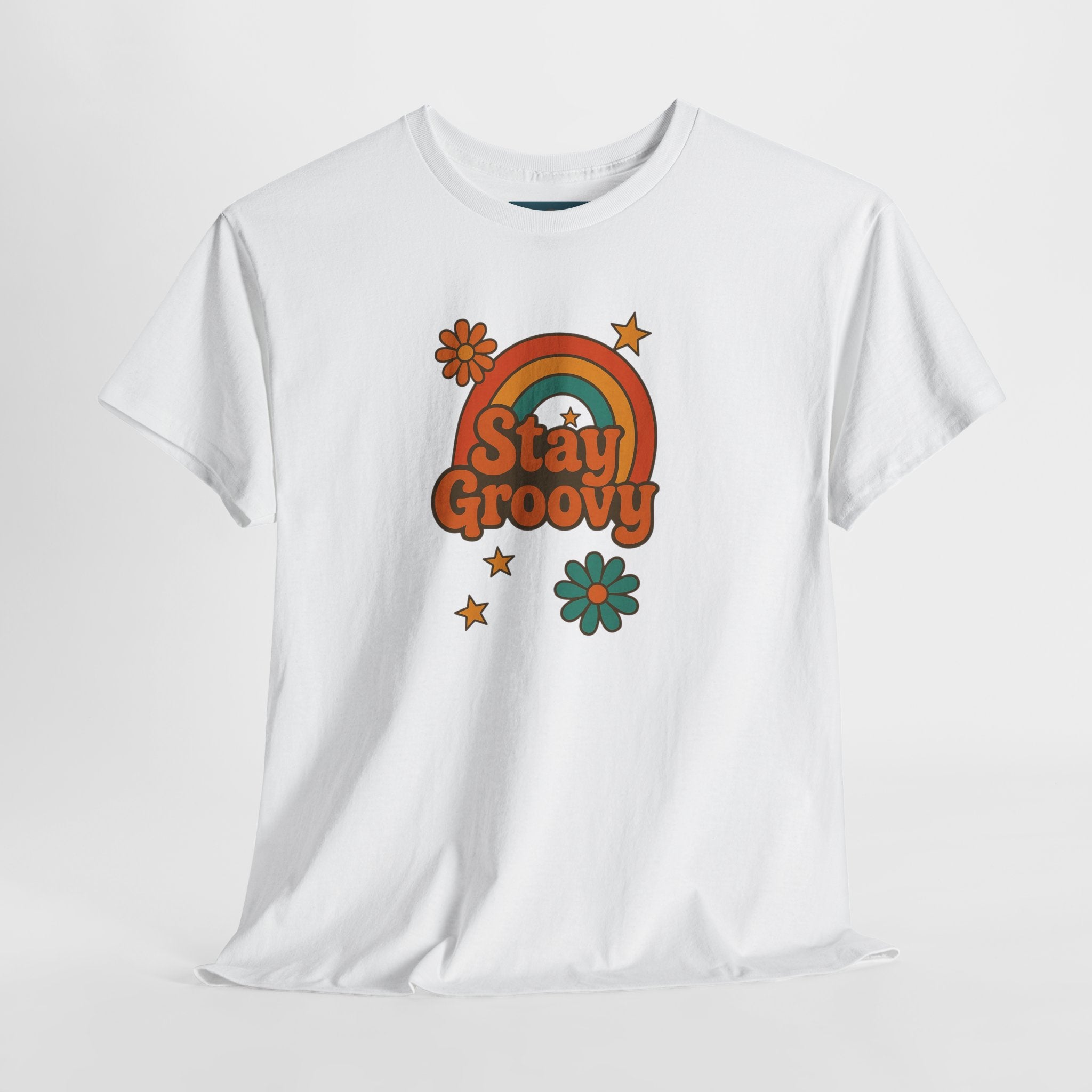 White t-shirt with 'Stay Groovy' graphic design featuring a rainbow and flowers on a white background.