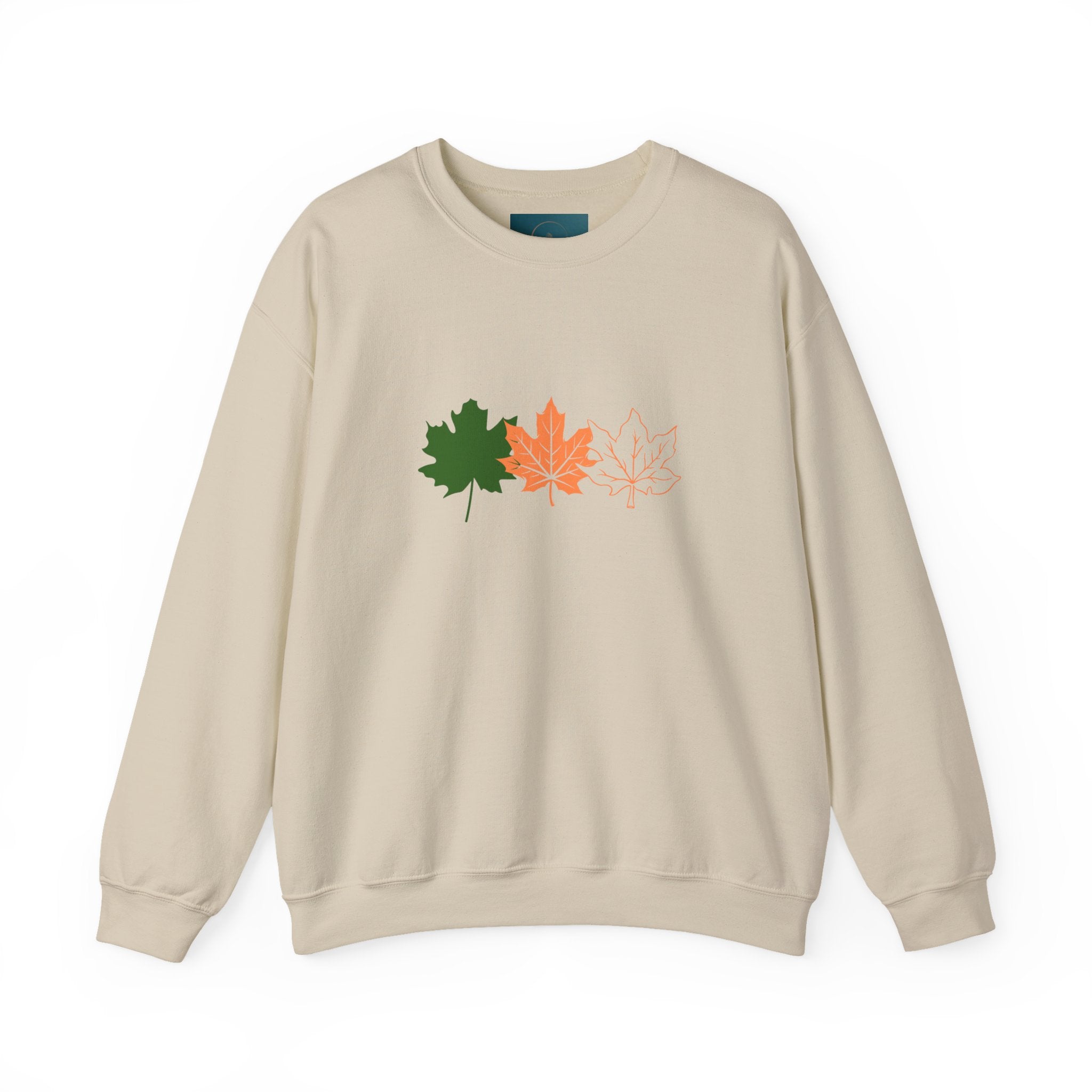 Beige sweatshirt with leaf designs on a white background