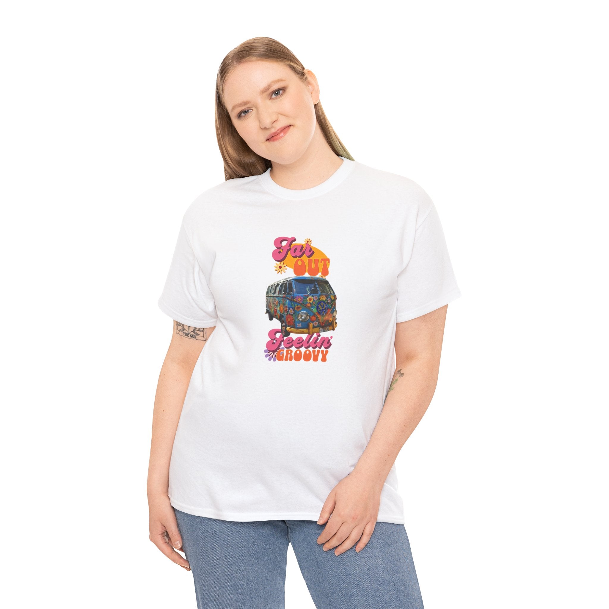 Person wearing a white t-shirt with a colorful vw bus graphic design on a white background
