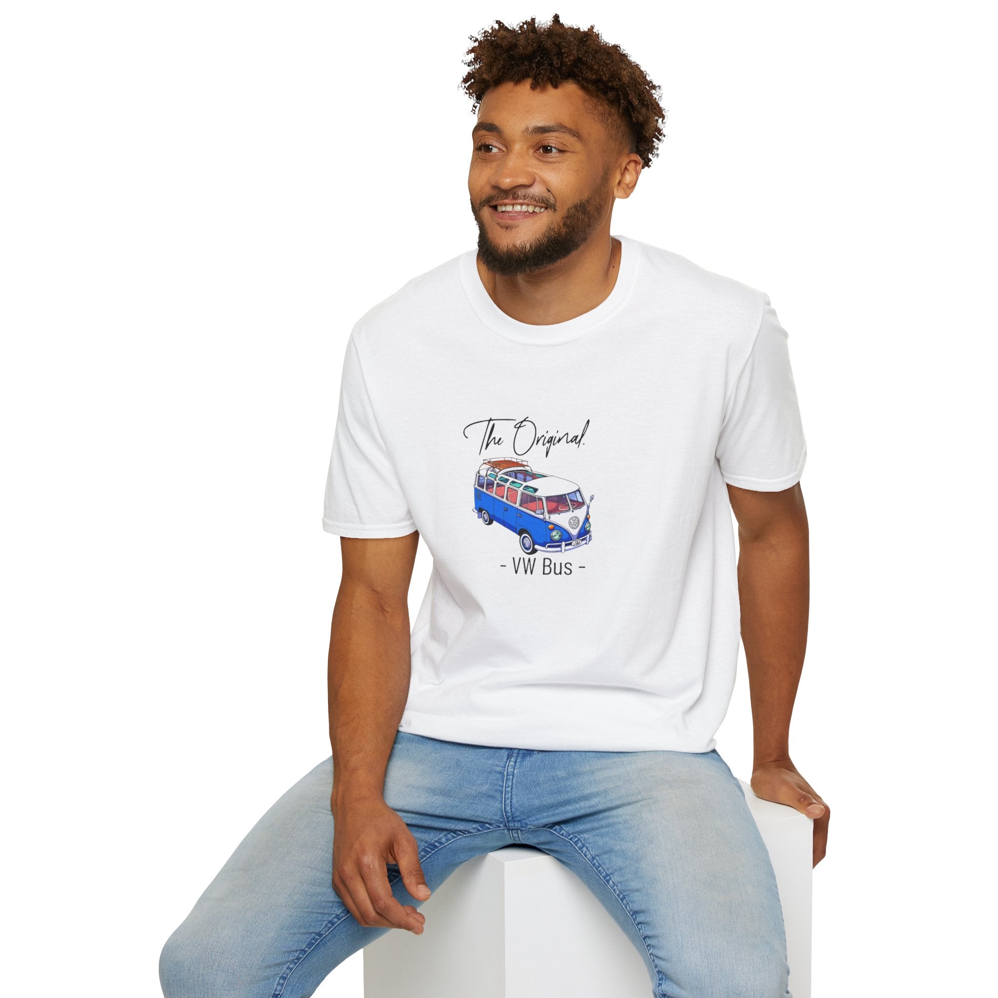Man wearing a white t-shirt with a VW Bus graphic on a white background