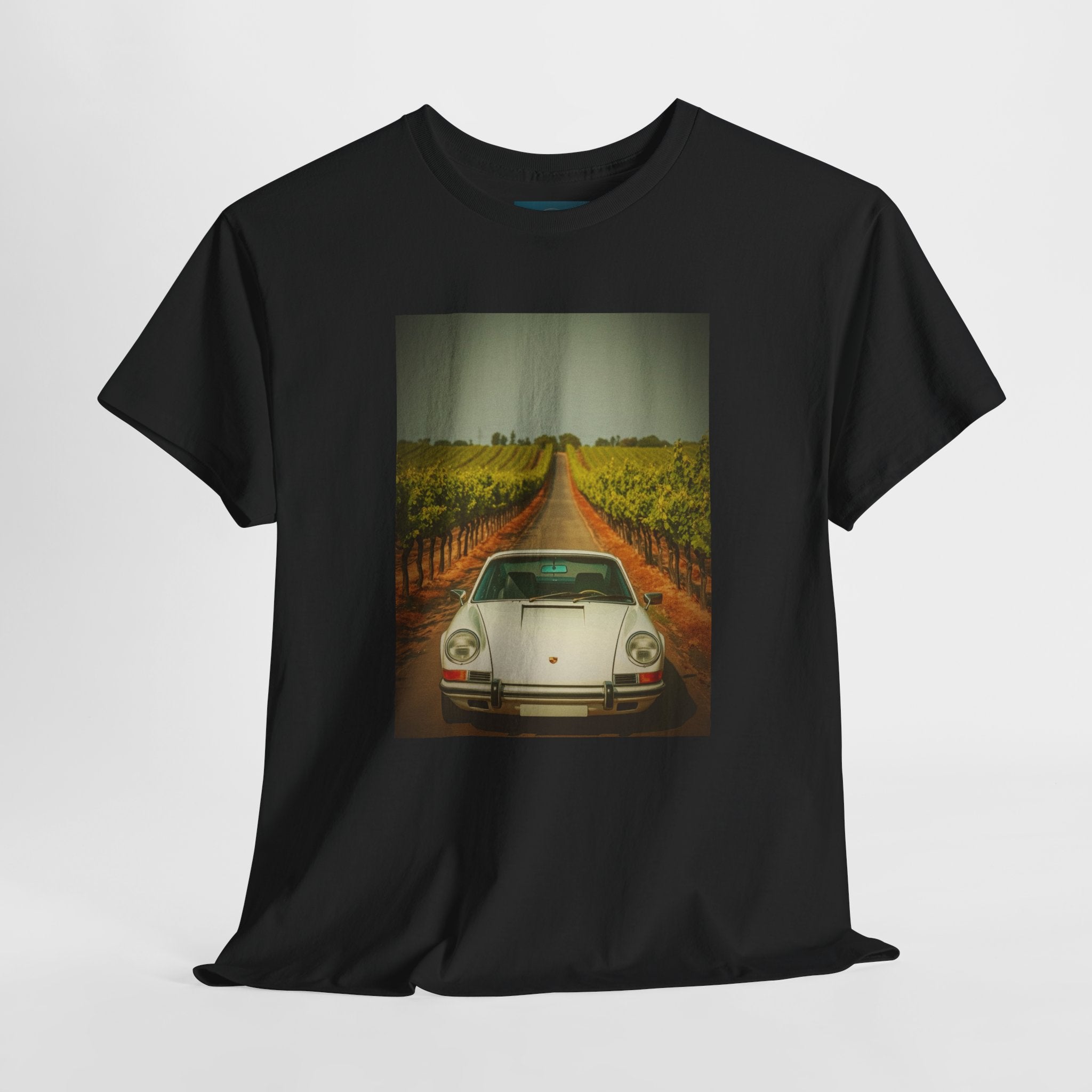 Black t-shirt with a printed design of a Porsche 911 car on a vineyard road.