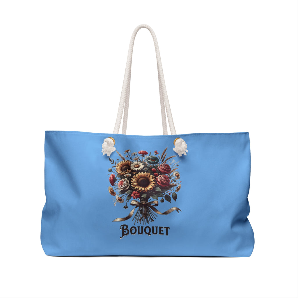 Blue tote bag with floral design and 'Bouquet' text on a white background