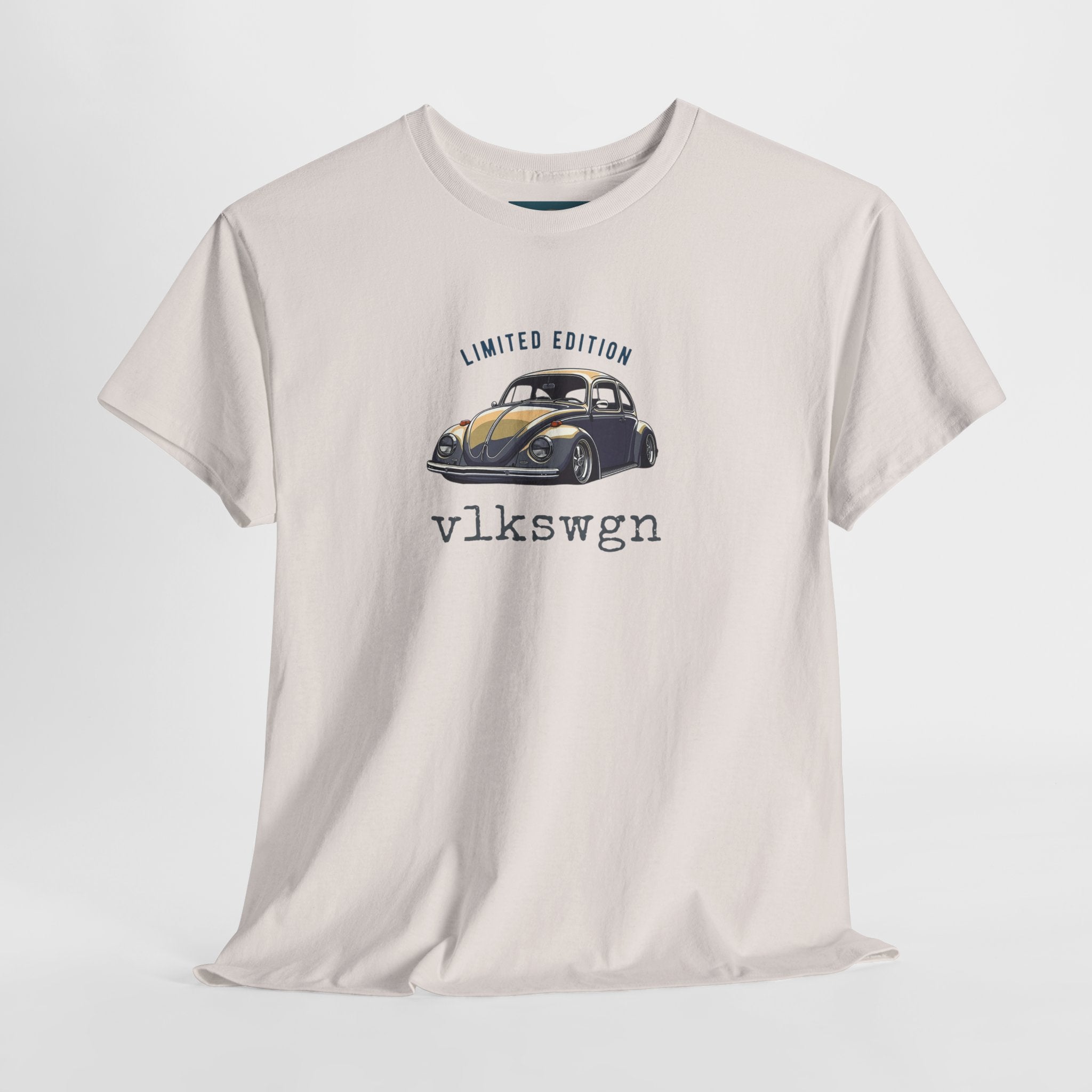 Beige t-shirt with a graphic of a vintage car and text on a white background