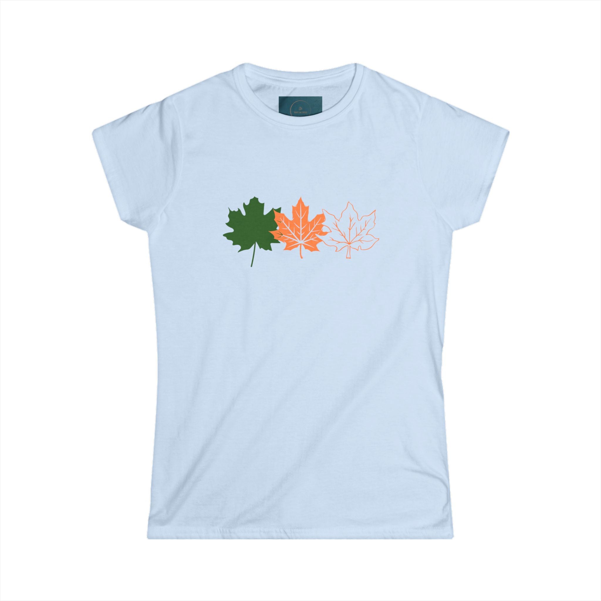 Light blue t-shirt with colorful leaf designs on a white background