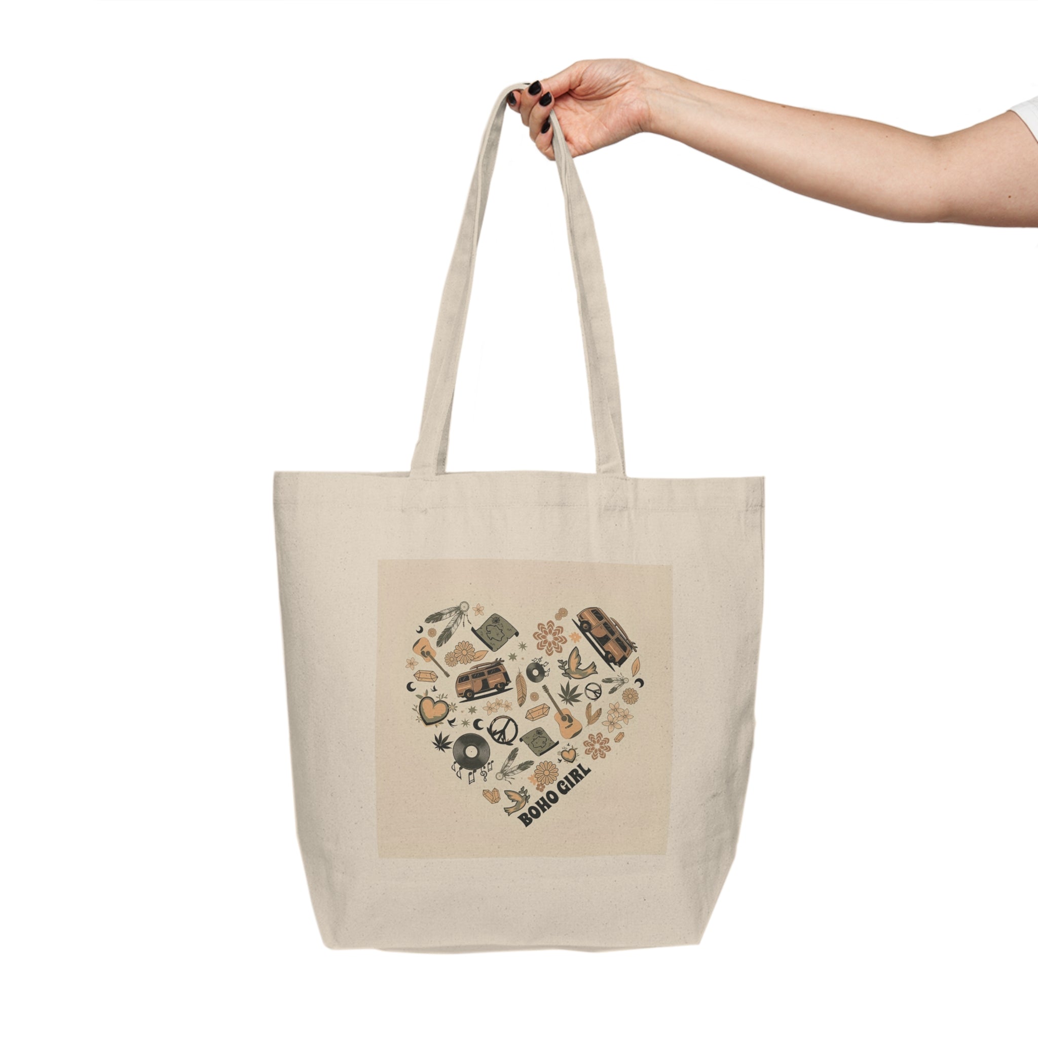 Beige tote bag with heart-shaped design and text held by a hand on a white background