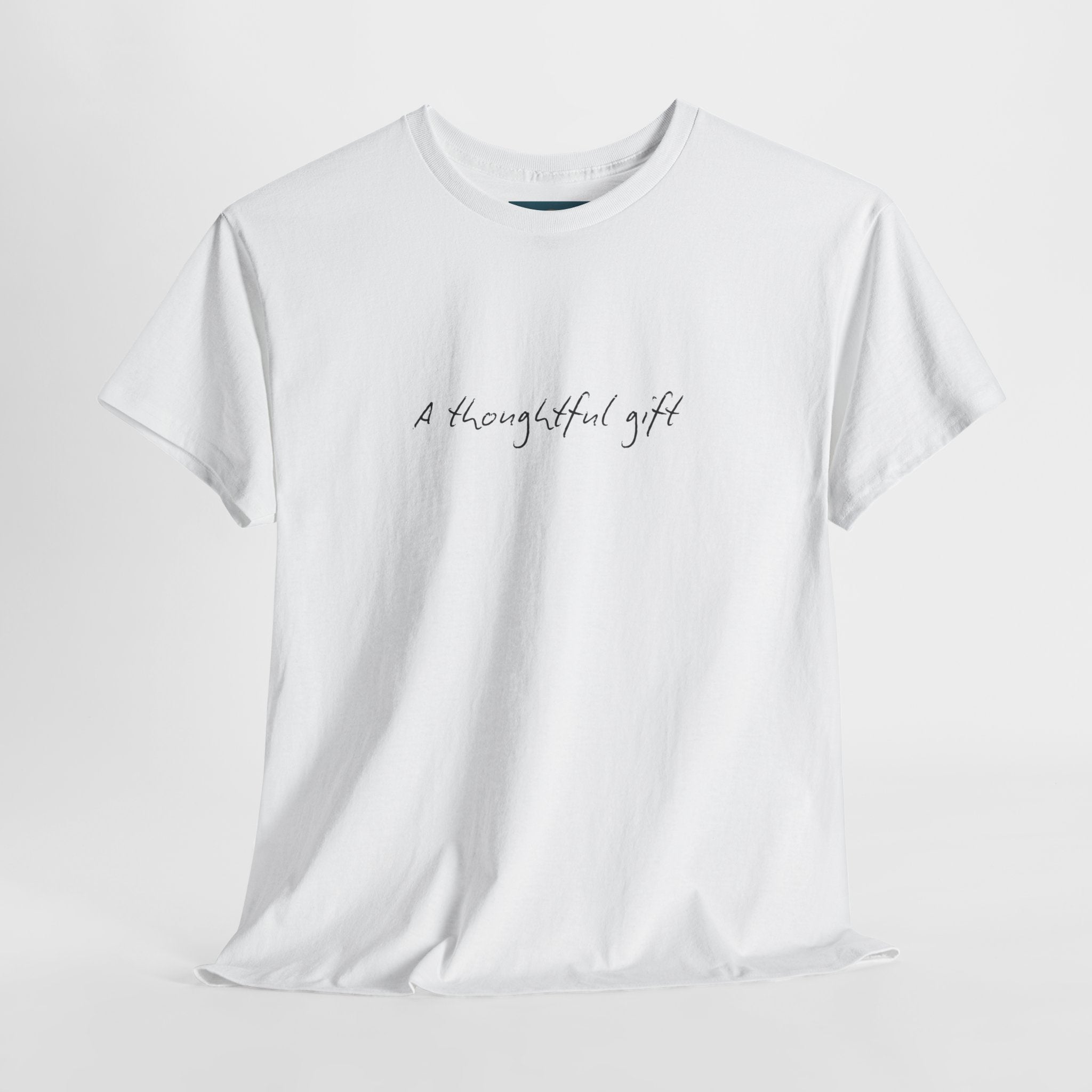 White t-shirt with 'A thoughtful gift' text on a light gray background