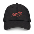 Black cap with red 'Porsche' logo on a white background
