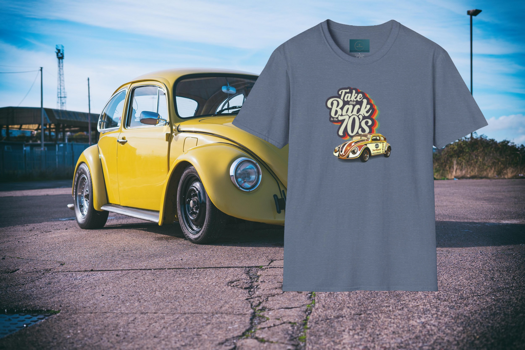 Yellow vintage car and gray t-shirt with 'Take Back 70s' graphic on a road.